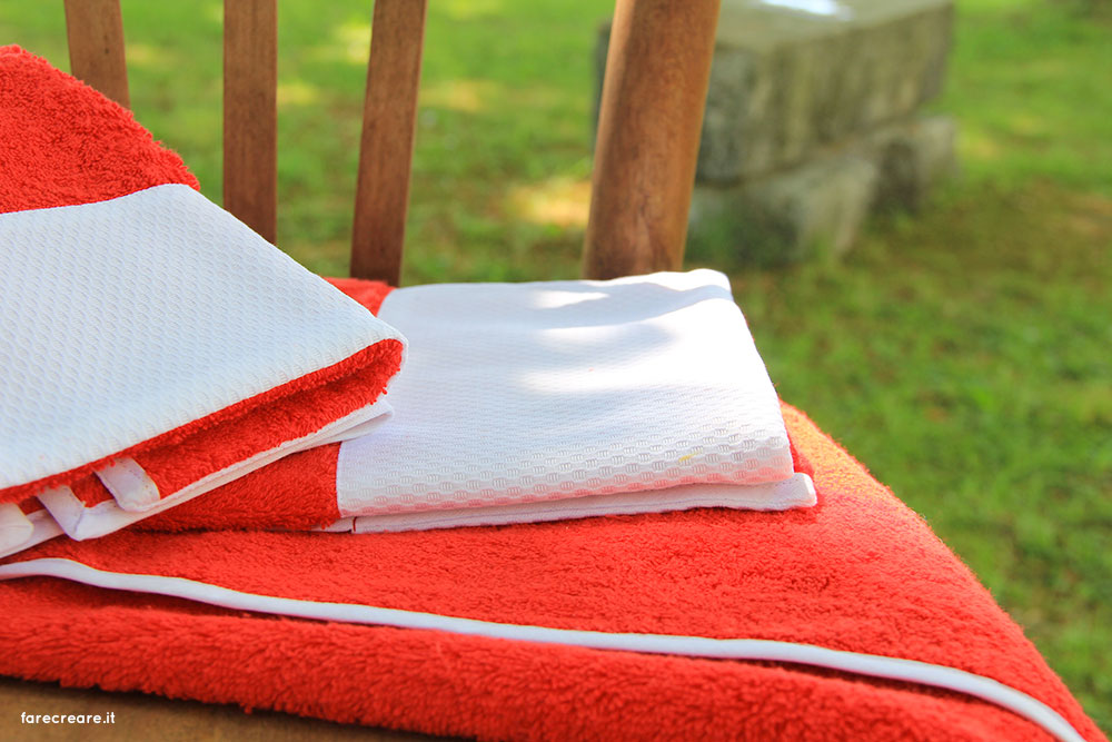 Lime Italy nuova collezioni asciugamani spugna - colore rosso con balza di piquet bianca di cotone.