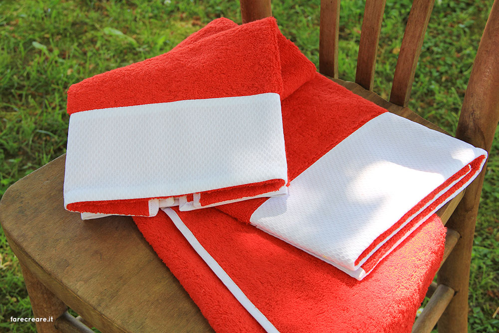 Lime Italy nuova collezioni asciugamani - colore rosso con balza di piquet cotone bianco.