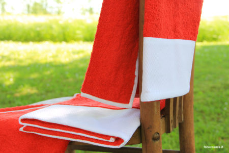 Lime Italy nuova collezioni asciugamani - colore rosso con balza di piquet cotone bianco.